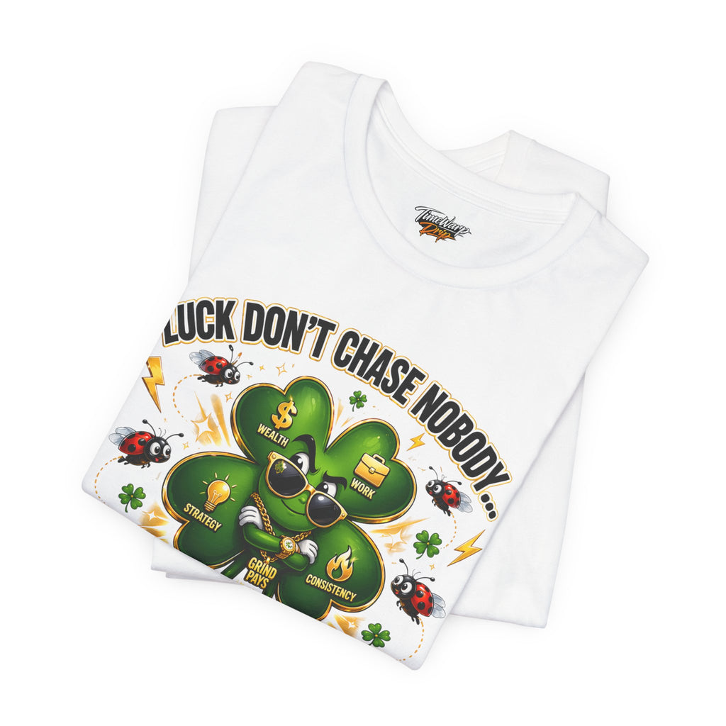 The TimeWarp Drip "Lucky Clover, 'Pulls Up Lives'" T-shirt, available in S-3XL, features a sunglasses-wearing four-leaf clover, ladybugs, dollar signs, and motivational words with the quote "Luck Don't Chase Nobody.