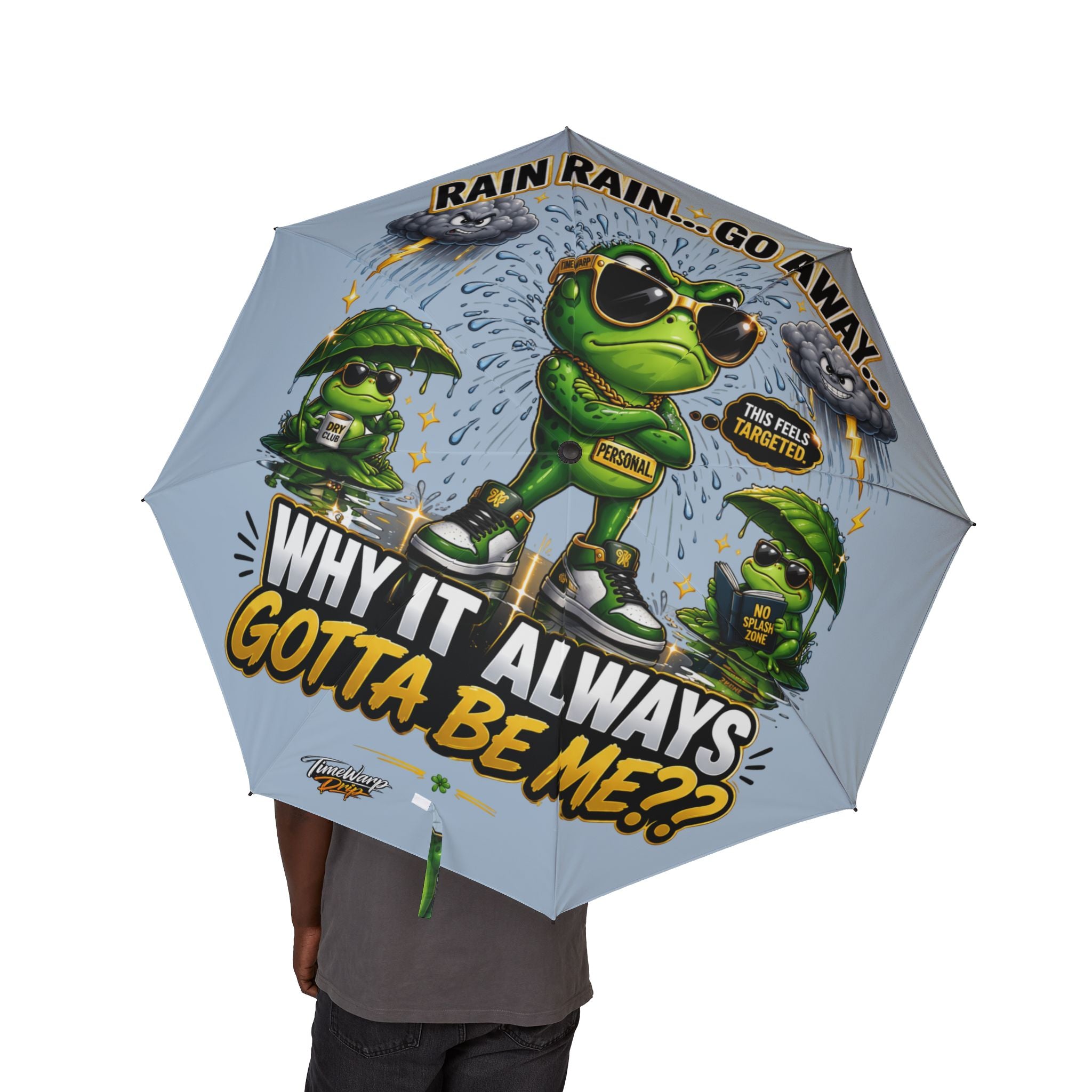 TimeWarp Drip check: Person rocking a foldable umbrella, light blue, with bold 'Rain? Go Away' frog cartoon for streetwise style. 