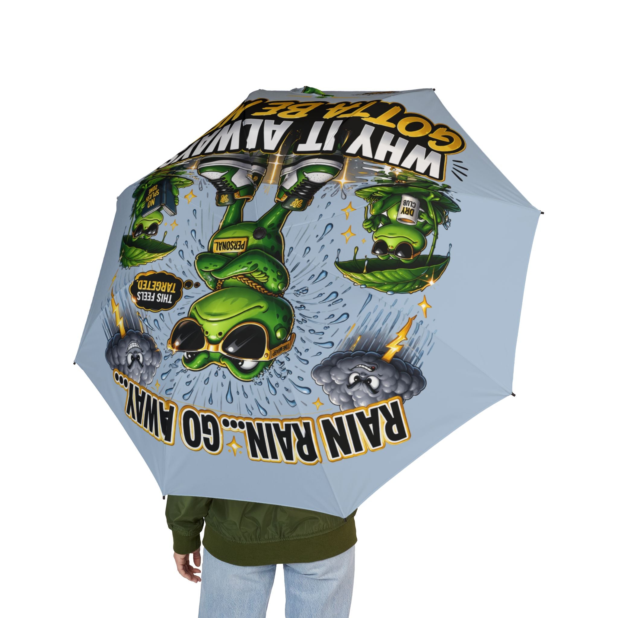 TimeWarp Drip Drip check: light blue foldable umbrella rocks a bold frog cartoon—rainproof, streetwise style on full display. 