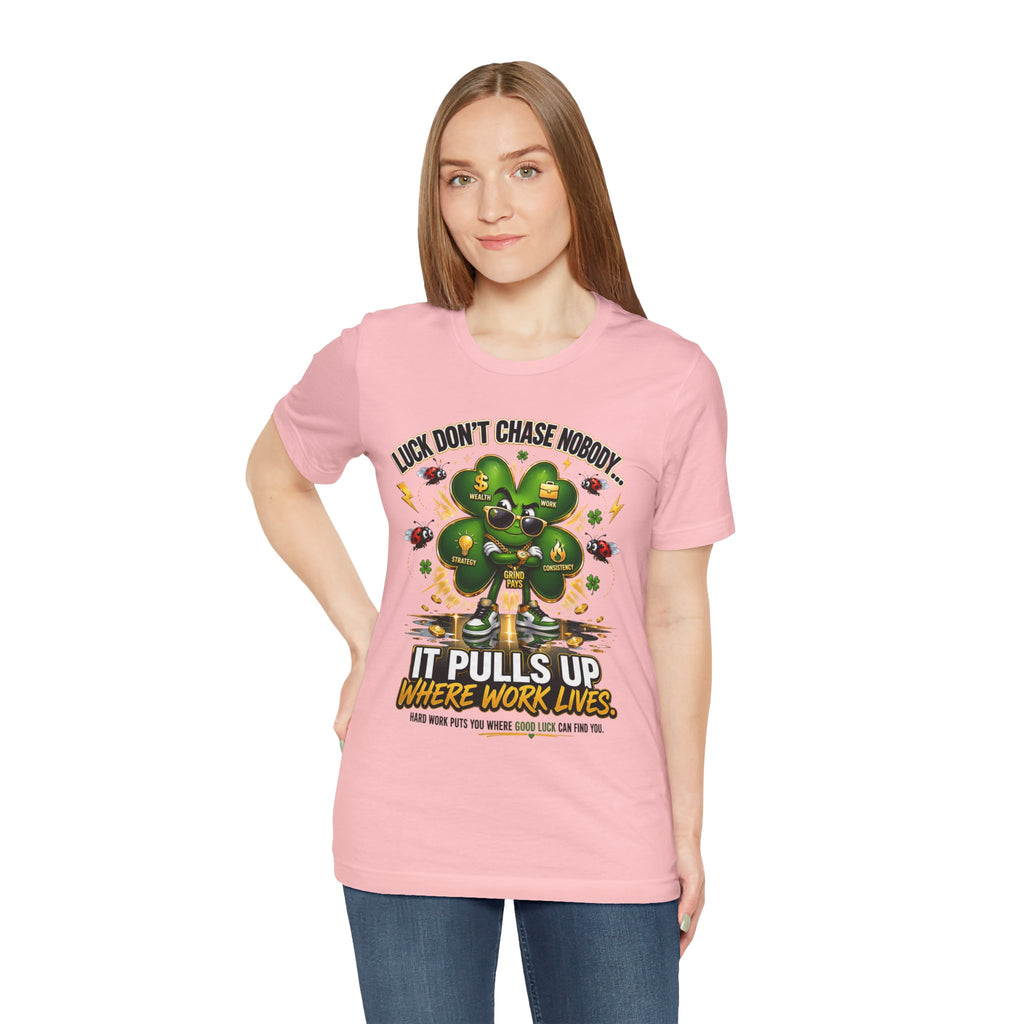 TimeWarp Drip Fierce woman rocking a pink "Luck Don’t Chase Nobody" 4-leaf clover tee—Airlume cotton, street drip vibes elevated. streetwear apparel