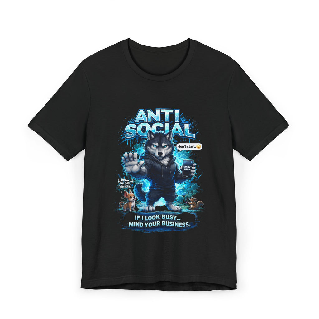 The Anti Social Wolf T-Shirt features a grumpy wolf with one paw up, speech bubbles, blue splashes, and the phrases "ANTI SOCIAL" and "IF I LOOK BUSY... MIND YOUR BUSINESS." A perfect funny introvert graphic tee.